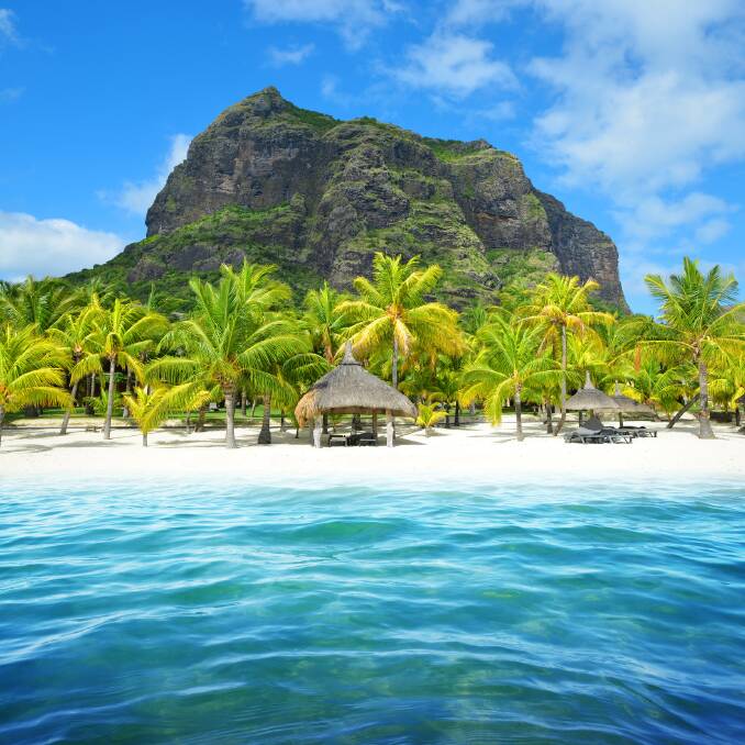A sandy beach and Le Morne Brabant mountain in Mauritius. Picture: Getty Images