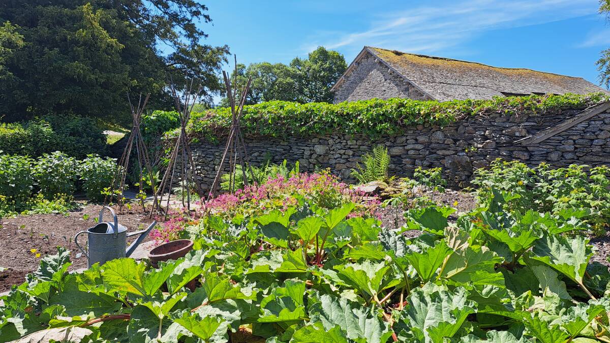 The garden at Beatrix Potter's house in Cumbria, England, where she wrote Peter Rabbit and other tales. Picture: Sarah Falson