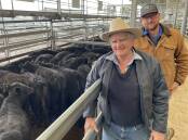John Rodd, Ian Morgan Livestock, and Henry Heggaton, South Wandobah, Spring Ridge, with a pen of 29 Angus steers sold by Bylong Agricultural for $1310. The steers will go onto the crop for finishing.