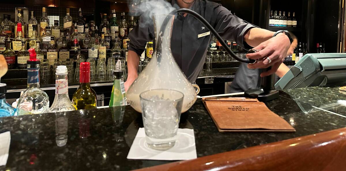 One of the Bonded Store's signature smokey cocktails. Picture by Georgia Rossiter