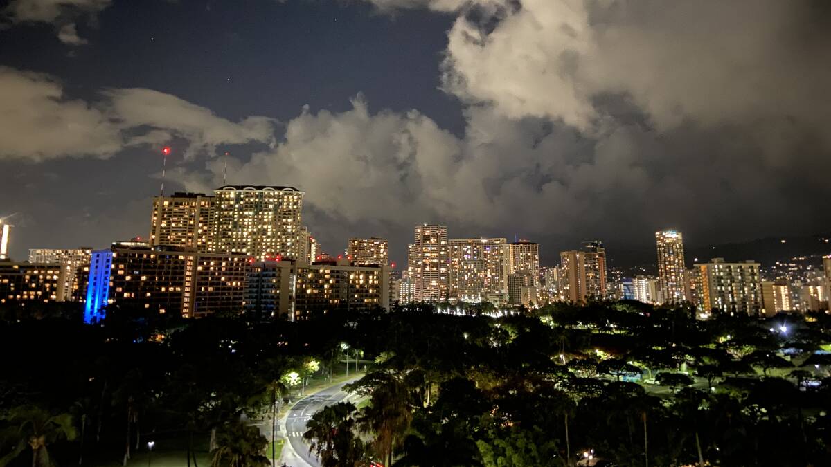 A view of Waikiki at night.